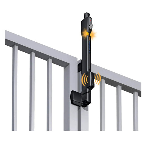 Straight Up Tough Top Pull Pool Safety Gate Latch With Audible Alarm Feature keeping gate secure on a gray pool gate.