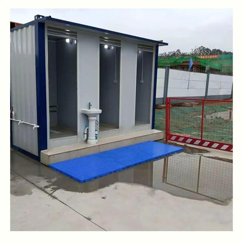 Lightweight Plastic Storage Pallet With Ventilated Grating For Garage And Basement Organization shown at construction site