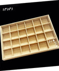 Switch Up Your Desktop Jewelry Tray With Adjustable Grid Dividers For Earrings And Rings Premium Sackcloth Organizer showing compartments.