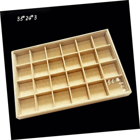 Switch Up Your Desktop Jewelry Tray With Adjustable Grid Dividers For Earrings And Rings Premium Sackcloth Organizer showing compartments.