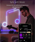 Man playing guitar with 6.5ft RGB LED Strip Tube Flexible With 16M Colors, USB C Powered, App Controlled Lighting, glowing music note.