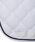 Close-up of Quilted Contoured Dressage Pad with braided trim, elegant stitch pattern in white, smooth arena performance feature.