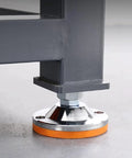 Base of Heavy Duty Workshop Maintenance And Assembly Workbench With Mounting Vise showing durable adjustable foot and steel support.
