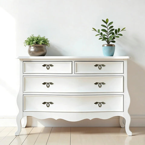 White dresser with Vintage Style Leaf Drawer Pulls for Cabinets and Dressers in Bronze Finish Premium Zinc Alloy Handles, two plants on top