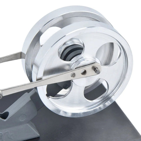 Hands On Stirling Engine Model Kit With Aluminum Alloy Construction External Combustion Engine For Realistic Physics Experiments A Kid Friendly STEM Educational Toy For Classroom Projects And Home Learning, close-up flywheel