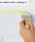 Two Inch Angled Detail Paint Brush For Cutting In Trim And Furniture Pro Grade applying paint along door edge