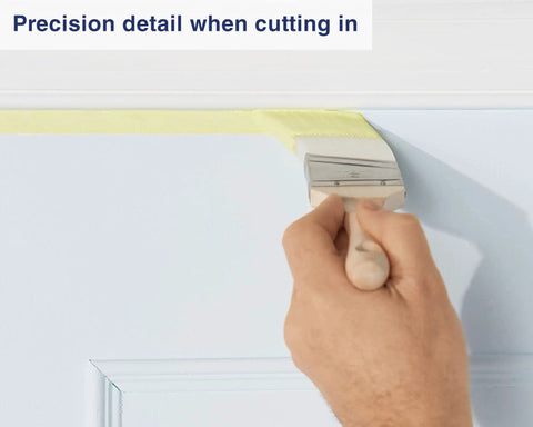 Two Inch Angled Detail Paint Brush For Cutting In Trim And Furniture Pro Grade applying paint along door edge