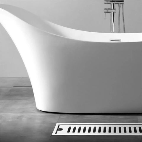 Top Shelf Rectangular Linear Shower Drain In Rust Resistant 304 Stainless Steel With No Sweat Hair Catcher Grate Slick Gold Tone 10X60CM near a modern bathtub.