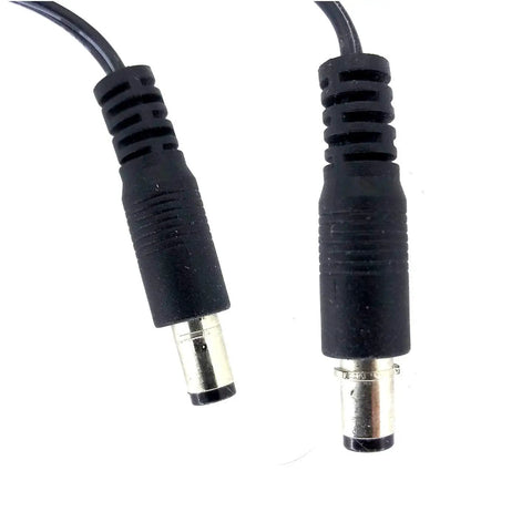 Close-up of dual connectors on the AC DC Power Supply PS 24AS 500mA For Stick Ons And Rack Mounts black power adapter.