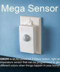 Smart Motion Temperature And Light Sensor HSM200 With Z-Wave Plus plugged into wall outlet, showing sensor and LED indicator.