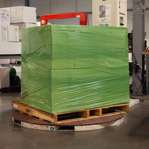 Heavy Duty Dark Green Stretch Wrap, 8 Rolls Of 18 By 1500 Feet, 63 Gauge industrial plastic film securely wrapped around a pallet.