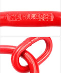 Close-up of red G80 Chain Sling Ring Oblong Master Link Hoist Ring with 8 Ton Capacity marking, heavy duty steel connector for lifting.