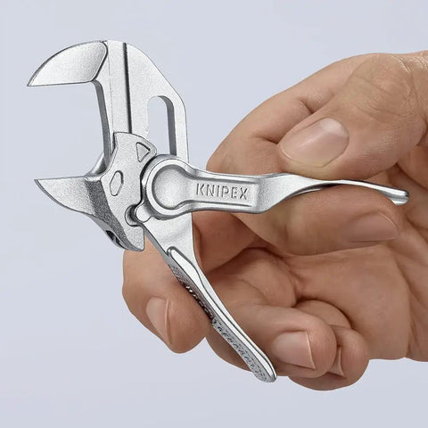 Hand holding Pliers Wrench XS 4 Inch One Hand Quick Adjust Pliers For Gripping Holding Pressing And Bending Up To Three Quarter Inch With Parallel Jaws