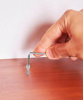 Hand using Allen key to install Beefy M3 Hex Socket Head Cap Screws With Nuts And Nut Assortment Kit In Stainless Steel on wood
