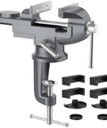 All-Purpose Table Vise With 3 Inch Jaw Opening And 360 Degree Swivel Base, Heavy Duty Bench Clamp For Woodworking And Metalworking, Thickened 0.2 Inch Jaw For Superior Grip, Fits Most Workbenches And Tables. gray cast iron table vise with 3-inch jaws and swivel base, shown with bench clamps