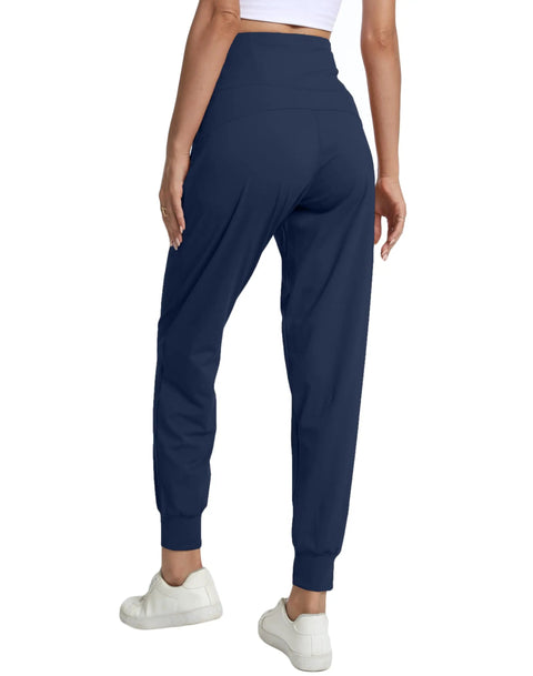 Back view of Fleece Lined Womens Joggers With Zip Pockets High Waist Athletic Pants For Travel Lounge And Workout Lightweight Warm Navy Blue Plus Size 3XL