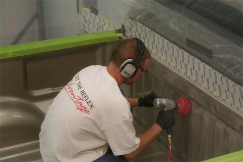 Person prepping truck bed liner using 6 Inch Cup Brush Nylon Filament 5/8-11 Thread For Metal Wood Aluminum And Plastic Prep Up To 2500 RPM