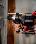 Heavy Duty 600 Watt Impact Drill Driver With 13 Mm Keyless Chuck And Variable Speed Control drilling into concrete wall