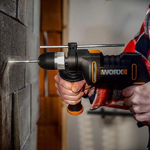 Heavy Duty 600 Watt Impact Drill Driver With 13 Mm Keyless Chuck And Variable Speed Control drilling into concrete wall