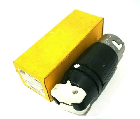 CS8265C AC Twist Lock Plug 50 Amp 250 Volt Male Canada Standard Black Nylon With Rynite Interior next to yellow box
