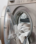 Front-loading Electrolux dryer with door open showing interior used for 137544800 Water Inlet Valve for Electrolux Dryers Replaces AP5736218