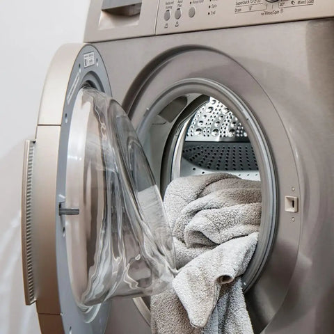 Front-loading Electrolux dryer with door open showing interior used for 137544800 Water Inlet Valve for Electrolux Dryers Replaces AP5736218
