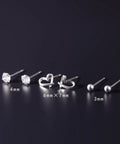 Three Pairs 925 Sterling Silver Stud Earrings Set For Women Hypoallergenic CZ Ball And Heart Mini Studs For Second Hole Lightweight Nickel Free Jewelry Includes Small Heart CZ Everyday Sparkle You Can Rock All Day. 4mm 3 pairs on dark background