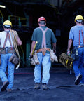 Workers carrying tools and a Replacement Four Port Rapid Charger Station Workhorse For Dewalt 20V Max Batteries