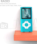 Compact MP3 Player With 32GB Memory Card, FM Radio, Voice Recorder in sleek blue on wooden surface with LCD on