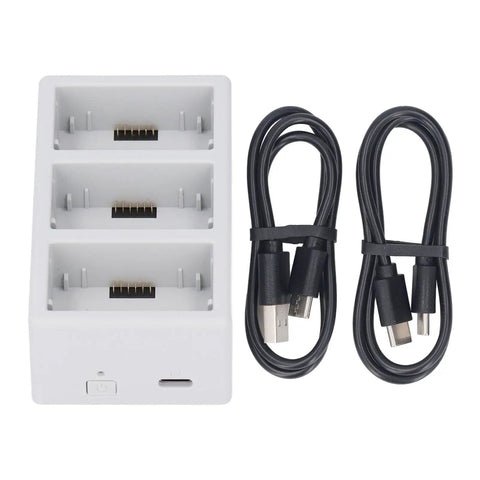 Top view of Three Bay Drone Battery Charger Hub with Fast 35W Dual Charging, showing three slots and two USB cables included.