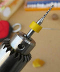 Close-up of a 10Pcs PCB Drill Bits Set Spiral Flute Carbide 0.3mm To 1.2mm with yellow collar for precision drilling