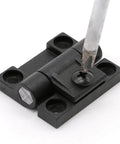 Adjustable Friction Positioning Torque Hinge E6 Black Plastic One Piece XK513 1B being installed with a screwdriver