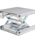 Front view of adjustable aluminum scissor lab lift with ribbed platform and screw knob