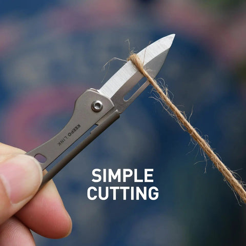 Titanium Mini Pocket Knife With Bottle Opener For EDC shown cutting rope