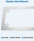 Close-up of chrome stainless steel motorcycle license plate frame with visible bolt holes and polished surface