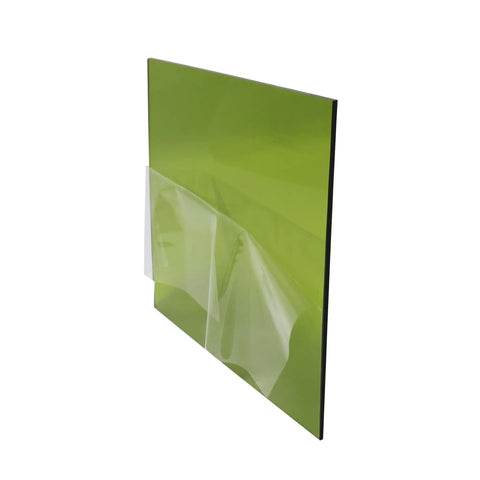 Heavy Duty Laser Safety Window Panel For Fiber Cutting And Engraving Built Tough At Twelve By Twelve Inches With Crystal Clear Viewport showing green panel with protective layer
