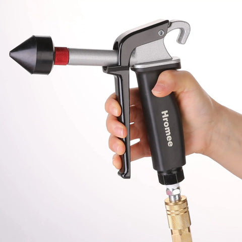 One Eighth Inch Rubber Tip Set For Air Blow Gun With One Half Inch High Flow Adapter in a hand showing air compressor connection