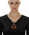 Bold Resin Stone Pendant Necklace With Long Rope Chain For Women Dope Statement Jewelry With Jeweled Metal Wire Accent Durable Wear Fashionable Costume Accessory In Rich Brown worn by model