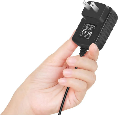 Hand holding an AC DC Adapter Replacement For RST599 Two Way Ham Radio Power Supply Cord Wall Charger Mains PSU IP67 Worldwide 100 240V