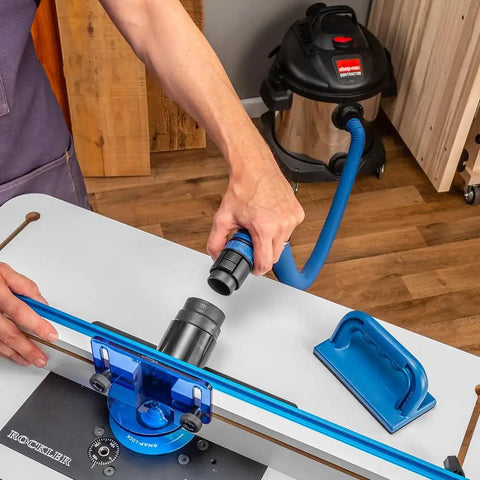 Person installing Click Connect Flexi Port Two And A Half Inch Fitting Adapter For Dust Collection on router table
