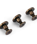 Premium Flat Head Brass Rivets And Copper Hardware Screws 20 Piece 5Mm Set For Heavy Duty Leather Crafting, close-up of three screws.