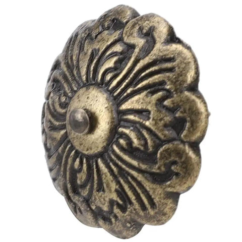 30 Piece Retro Zinc Alloy Upholstery Tacks And Furniture Nails 22mm Round Heads With 10mm Shank For Sofa Chair Bed DIY Makeovers To Snag Quick Fixes And Level Up Your Home Digs Today, decorative bronze nail with floral design, close-up.