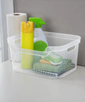 Solid As A Rock Clear Storage Bins Three Pack Tough As Nails Transparent Plastic Crates Built For Closet Shelf And Garage Organizing Zero Fuss Setup Measuring 14 By 11 By 7 Inches with cleaning supplies inside.