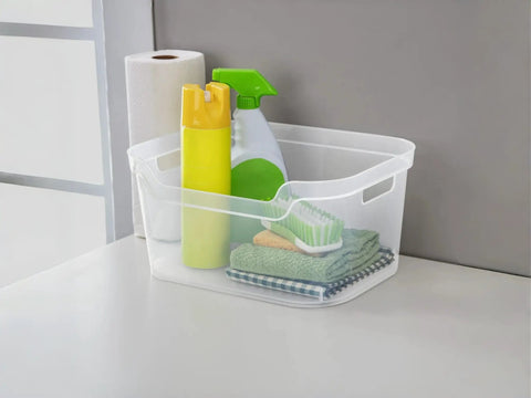 Solid As A Rock Clear Storage Bins Three Pack Tough As Nails Transparent Plastic Crates Built For Closet Shelf And Garage Organizing Zero Fuss Setup Measuring 14 By 11 By 7 Inches with cleaning supplies inside.