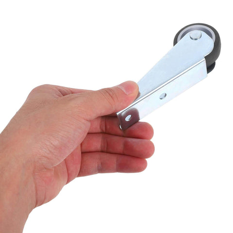 Hand holding one piece of 2-Pack Sliding Door Bottom Wheels With Rubber Casters, Upgraded Load-Bearing Anti-Sag Track Rollers