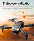 Dope 4K Dual Camera Foldable Drone for Beginners and Families flying with trajectory indication in desert landscape