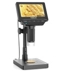 4.3 Inch Digital Coin Microscope with Built In Scale and illuminated magnifier displaying a detailed image of a coin on screen.
