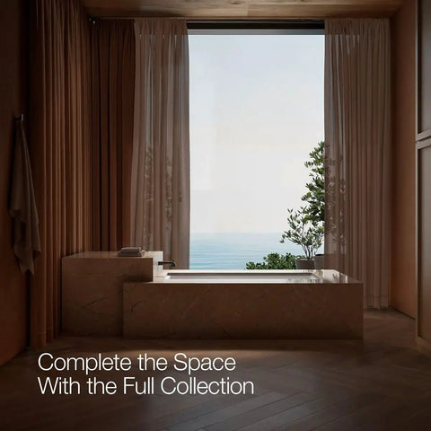 Luxury bathroom with ocean view, featuring a sleek modern tub and floor-to-ceiling curtains.
