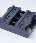 Top Shelf H90 Style Precision CNC Bench Vise With Self Centering Grips And Flexible Four Five Axis Rotation For Smoother Milling Operations and Rock Solid Workholding Performance, black metal, top view.
