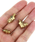 Pro Grade Metric Brass Grease Nipple Assortment Kit 15 Pieces M4 Straight 45 Degree 90 Degree Angled Zerk Fittings in hand